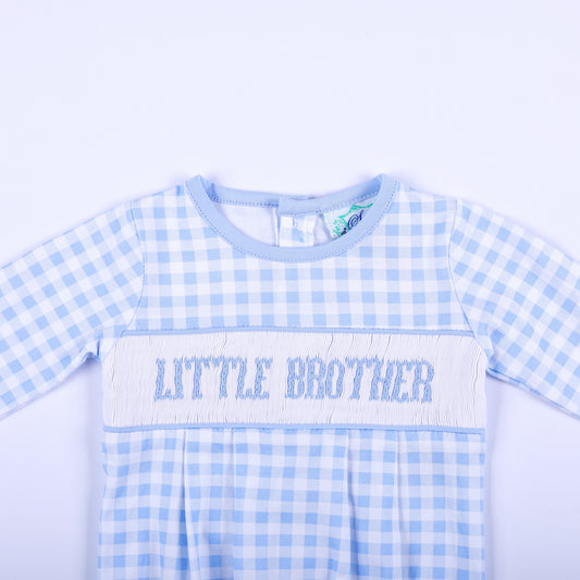 Close up of hand smocked chest bodice on blue gingham baby boy sleep sack layette with Little Brother text.