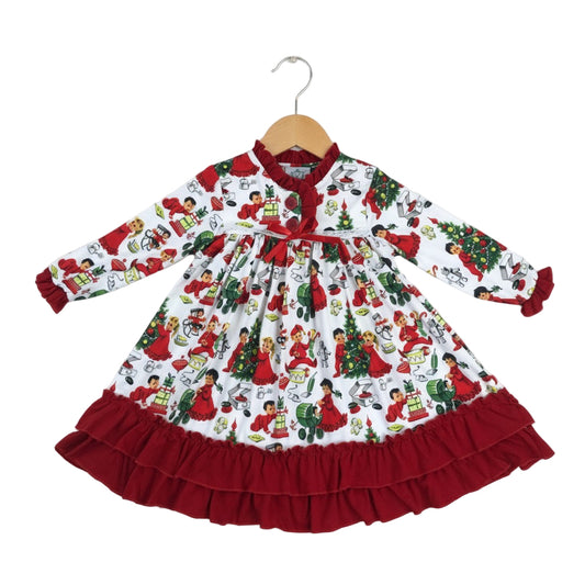 Girls vintage Christmas toy print long-sleeve nightgown with red ruffle trim and white lace detail.