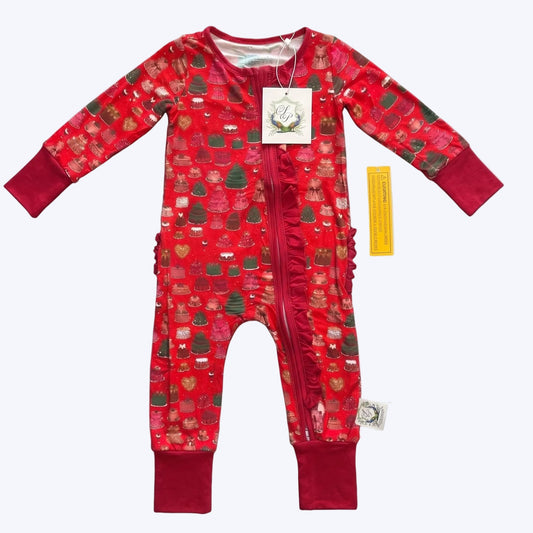 Holiday Cake Delight bamboo ruffle zippy sleeper with attached tags on a clean white background