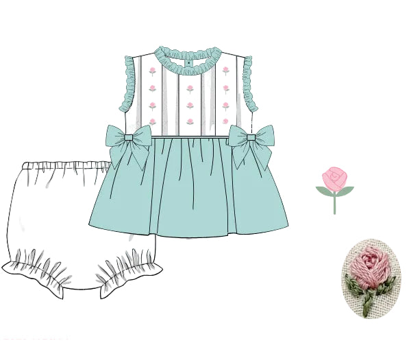 Ivory and mint hand-smocked girls set with pink flower trellis embroidery and matching bloomers.