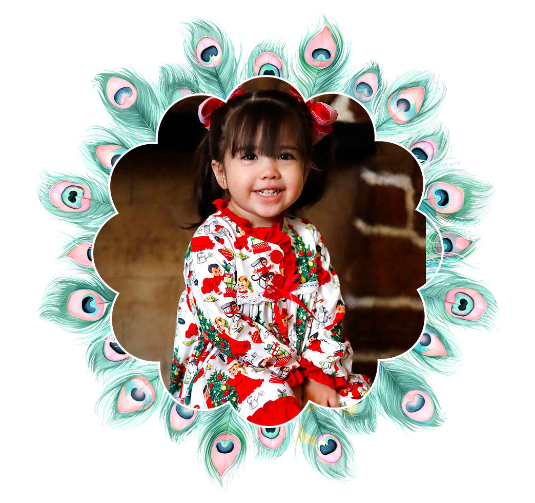 Young girl wearing a festive Christmas lounge set for the girls loungewear collection.