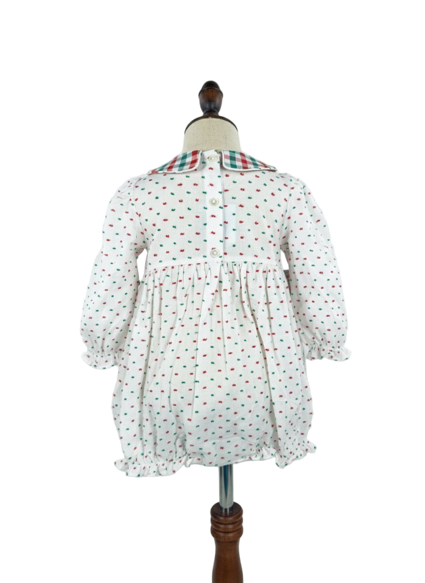 Back image of Girls Hand Smocked Swiss Dot Christmas Tree Bubble romper featuring a red smocked bodice with embroidered trees and a plaid Peter Pan collar.