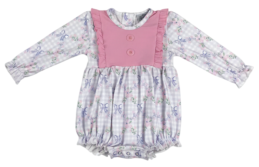 Grandmillennial floral girls bow bubble romper featuring a lavender gingham print with pink roses and blue bows, accented by a solid pink ruffled bib with buttons and long sleeves.