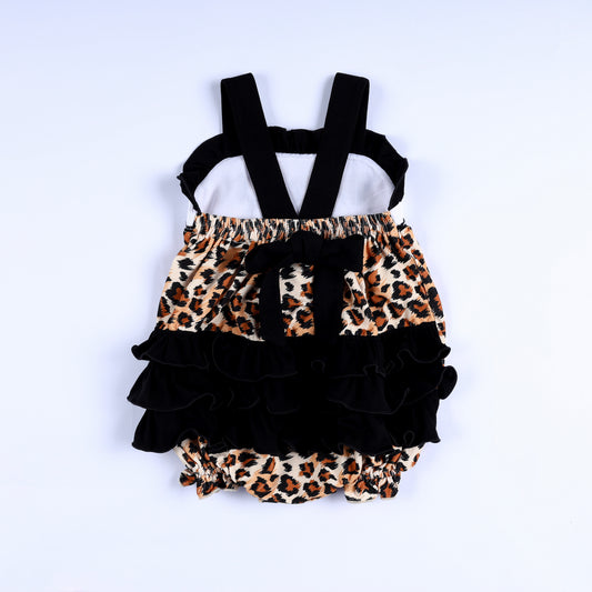 Back view of safari mouse leopard smocked baby bubble with black shoulder straps and layered ruffle bum.