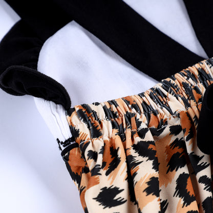Detailed view of elastic back waistband and black ruffle strap on leopard print safari mouse smocked bubble romper.