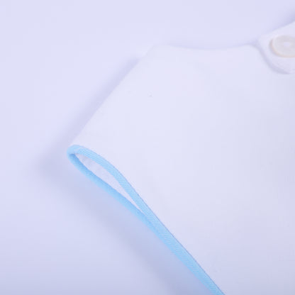 Detailed close-up of soft light blue piped edge piping on sleeveless armhole of baby boy bubble romper.