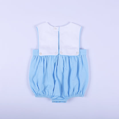 Full back view of light blue classic baby boy bubble romper featuring white top panel with button closures.