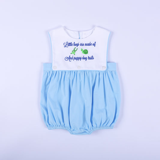 Front view of light blue baby boy embroidered bubble romper featuring nursery rhyme frog and snail yoke.