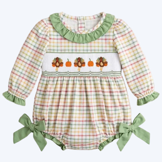 Baby girl Thanksgiving smocked plaid bubble romper featuring embroidered turkeys and pumpkins on the chest