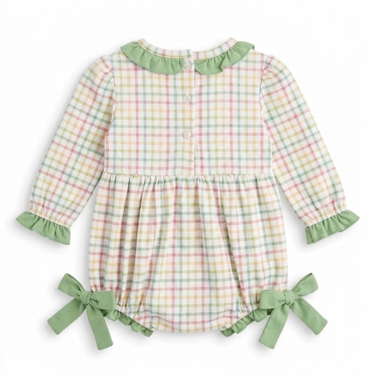 Back view of baby plaid bubble romper showing button-down back closure and ruffled green collar.