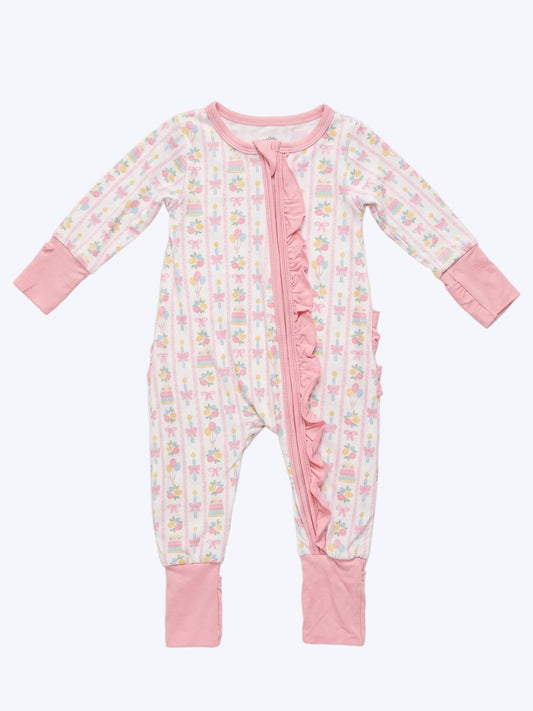 Birthday Celebration bamboo viscose ruffle zippy flat lay on a solid light studio backdrop