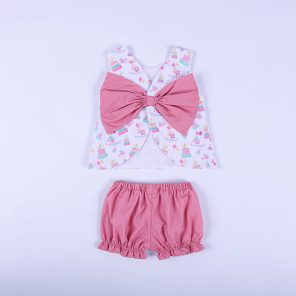 Back view of the birthday girl bloomer set showcasing the oversized solid pink statement bow and ruffle bloomers.