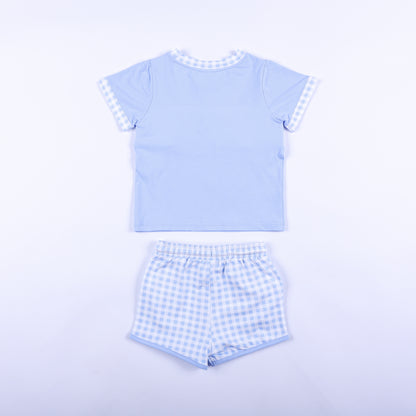 Back view of boys light blue Big Brother set with solid blue shirt back and matching gingham shorts outfit.