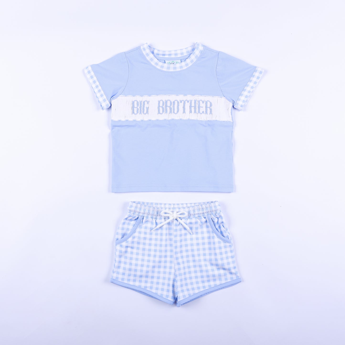 Front view of blue gingham big brother hand smocked shorts set with embroidered chest panel and matching shorts.