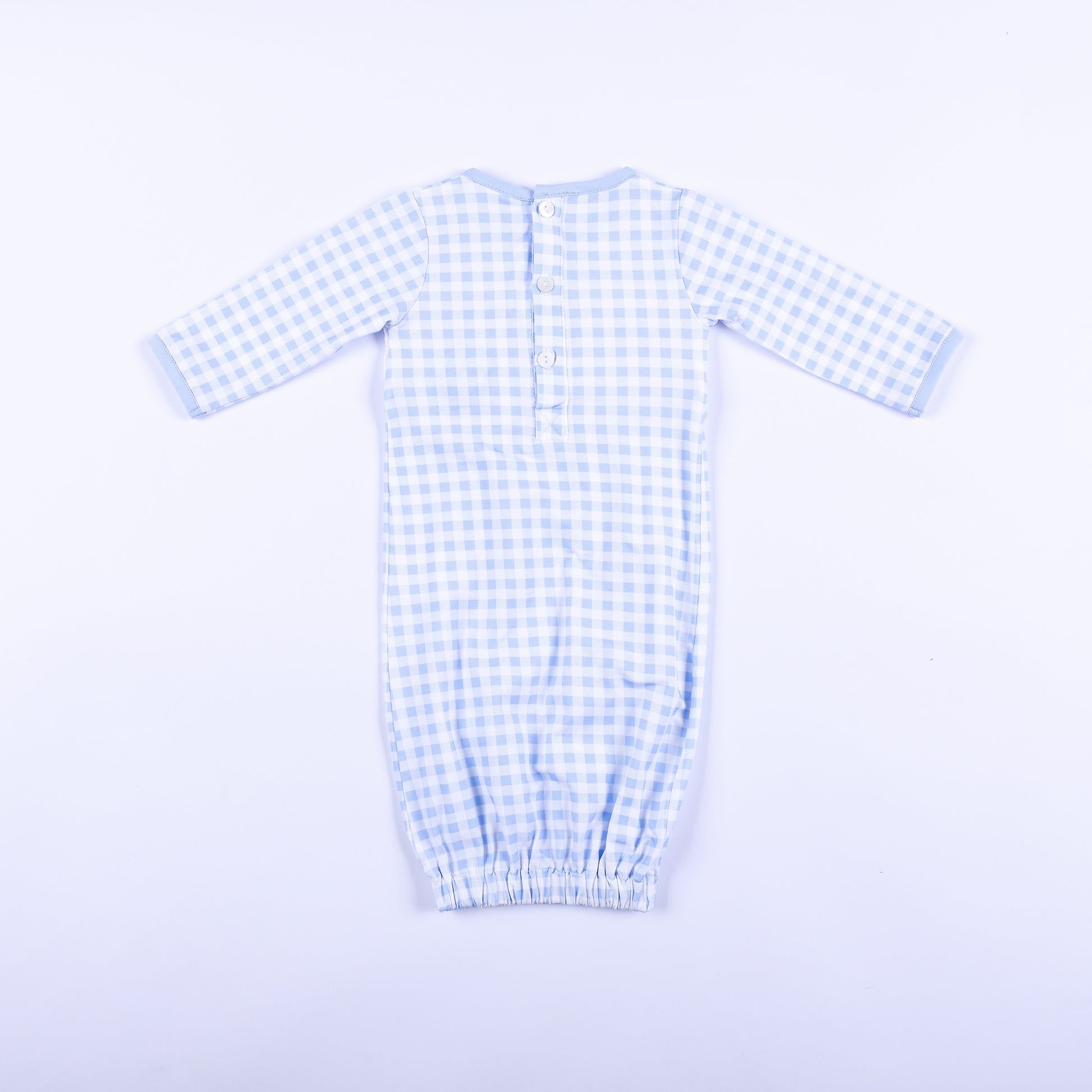Full back view of light blue gingham baby boy sleep sack layette gown showing back button placket closure.