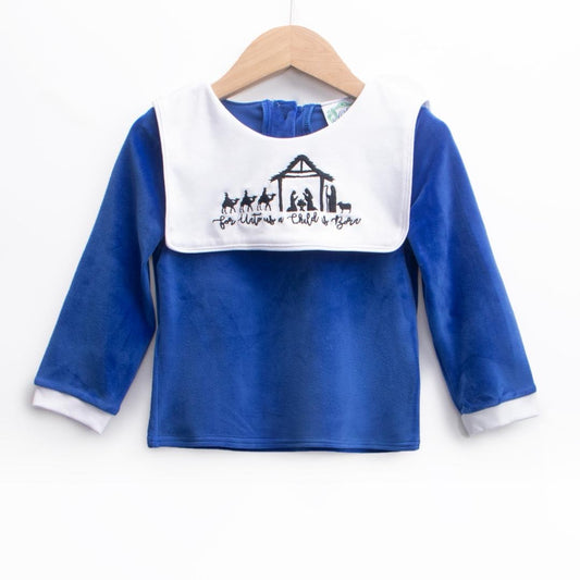 Boys blue velvet Christmas shirt with white bib collar featuring embroidered Nativity scene and scripture.