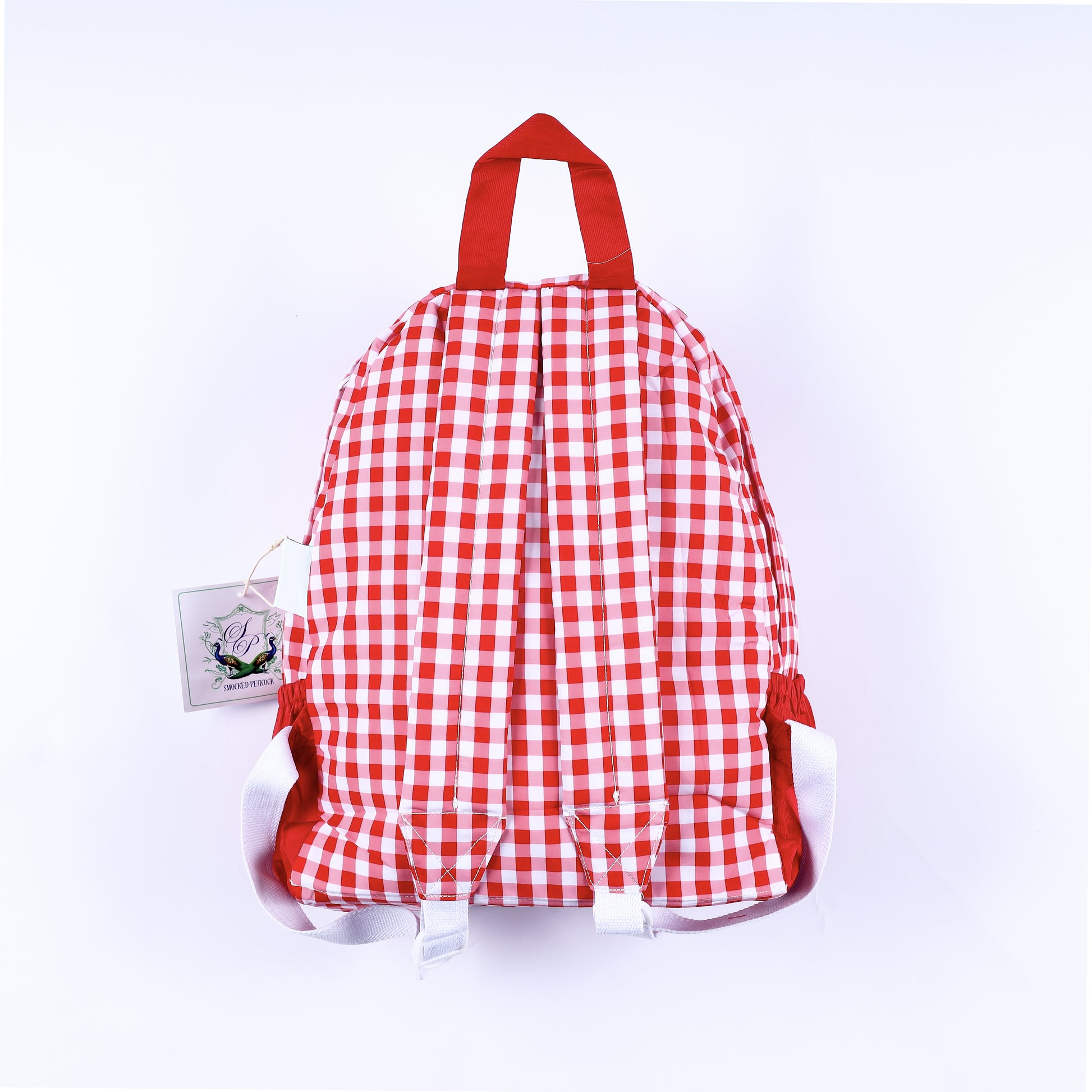 Back view showing padded red gingham shoulder straps on boys hand-smocked Mickey Mouse full-size backpack.