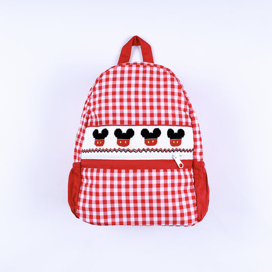 Front view of hand-smocked boys Mickey Mouse red gingham full-size backpack with embroidered details.