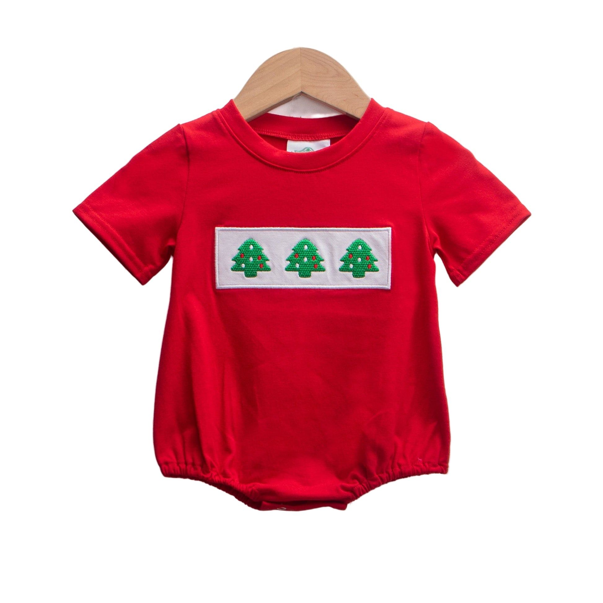 Red boys bubble romper featuring an embroidered trio of Christmas trees on a white chest panel.