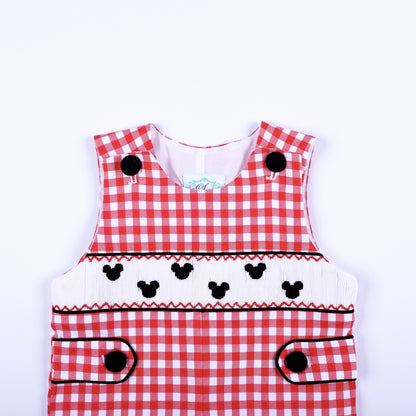 Close view of boys red gingham jon jon showing hand smocked chest panel with black embroidered mouse silhouettes.