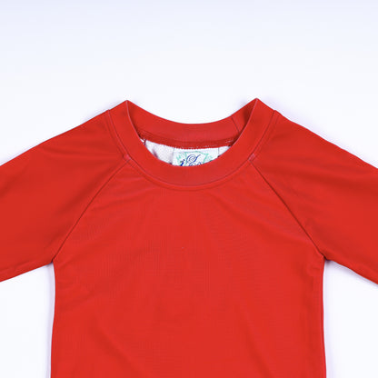 Close-up view of the durable crew neckline and stitching on the boys red long sleeve swimwear rash guard.