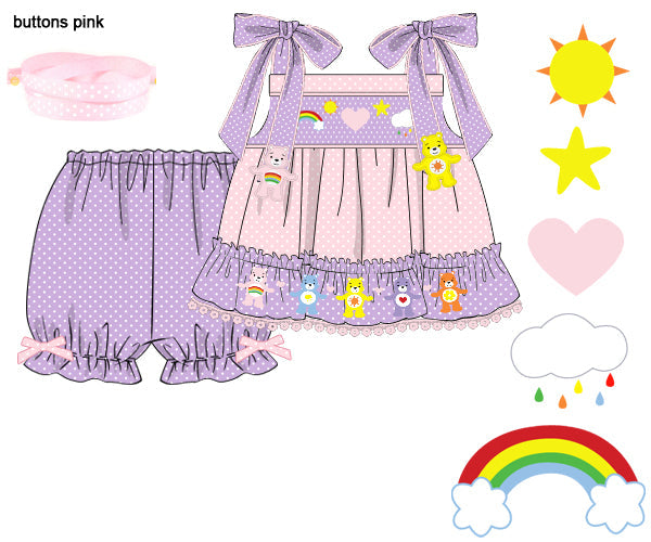 Hand-smocked girls purple polka dot short set featuring embroidered kindness bears, rainbows, and shoulder bows.