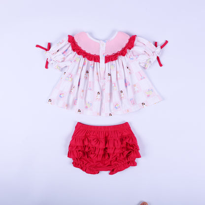 Back flat lay view of the Dolly & Me vintage toys tunic top with buttons and the dark pink tiered ruffled bloomers.