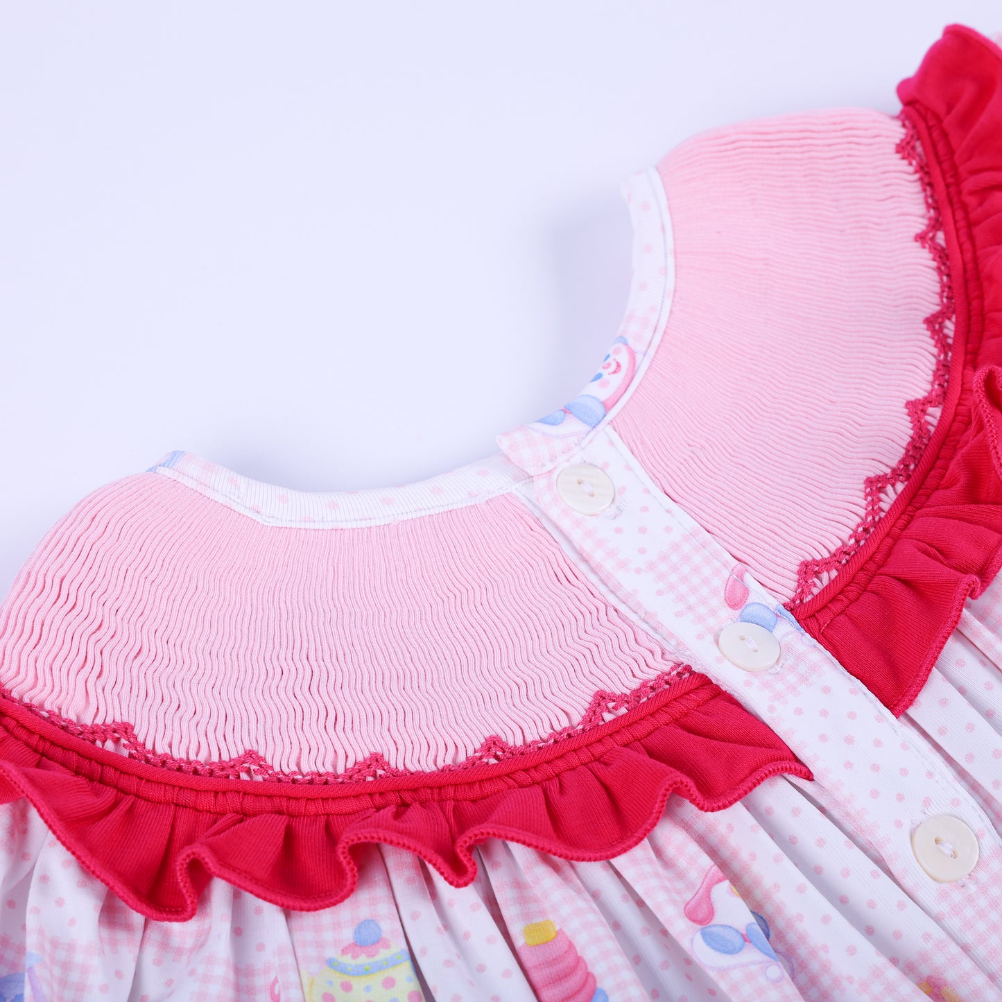 Angled close up of the white button back details and smocked ruffle collar on Dolly & Me vintage toys tunic top.