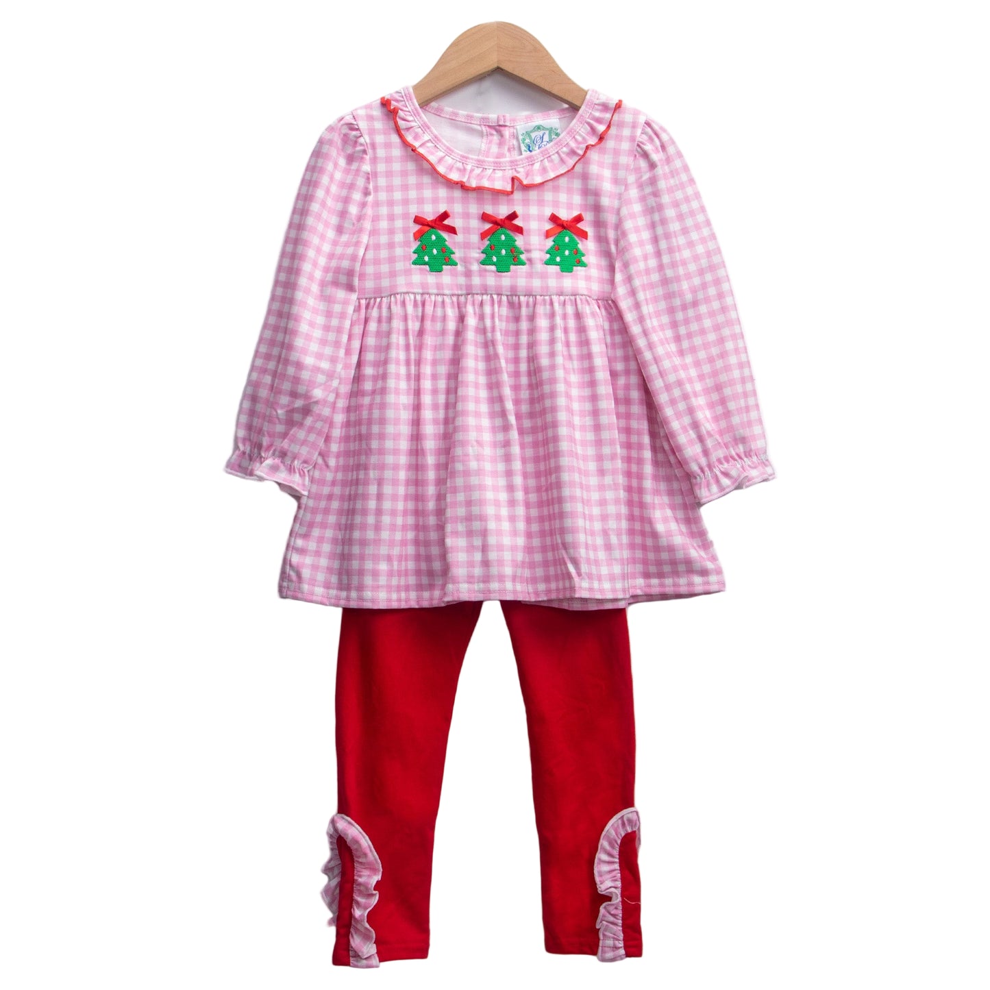 Girls' pink gingham top with three embroidered Christmas trees and red ruffle pants from the Embroidered Christmas Tree Trio set.