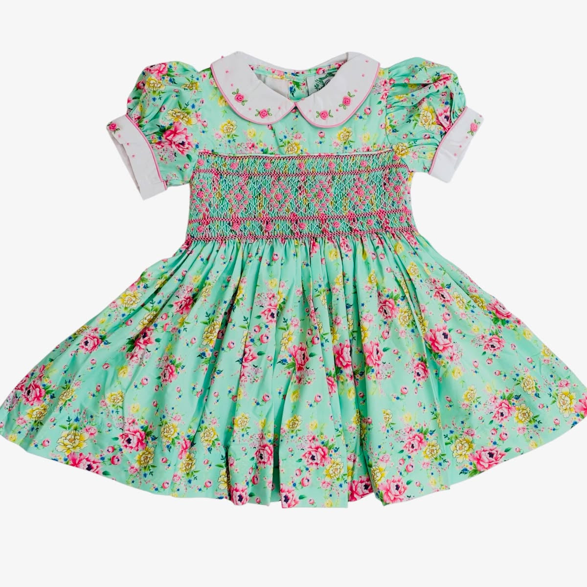Girls hand-smocked vintage floral dress in mint green with full gathered skirt