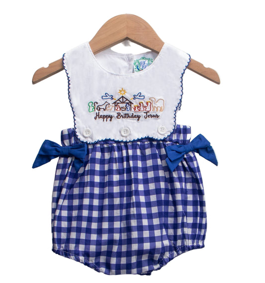 Girls blue gingham smocked bubble with Nativity embroidery, "Happy Birthday Jesus" text, and side bows.