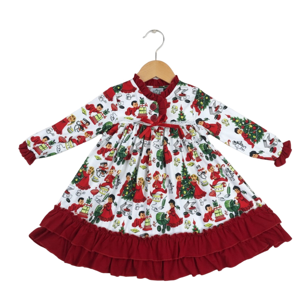 Girls vintage Christmas toy print long-sleeve nightgown with red ruffle trim and white lace detail.