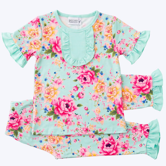 Girls mint green vintage floral lounge set with flutter sleeves, bib ruffle detail, and ruffled pants