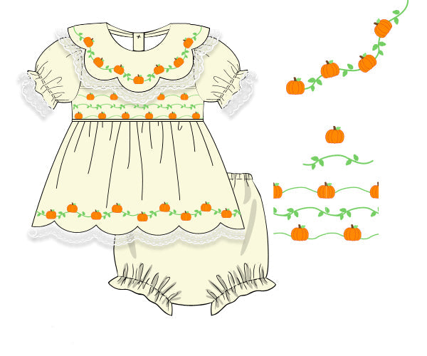 Hand-smocked buttercream girls outfit set featuring embroidered pumpkins on the scalloped collar, chest, and hem.