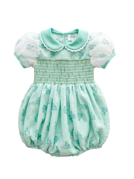 Mint green baby romper with floral patterns on a white background