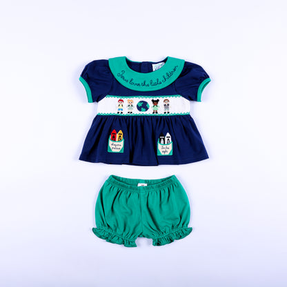 Full front view of Jesus Loves the Little Children navy hand smocked top and green ruffle bloomer set.