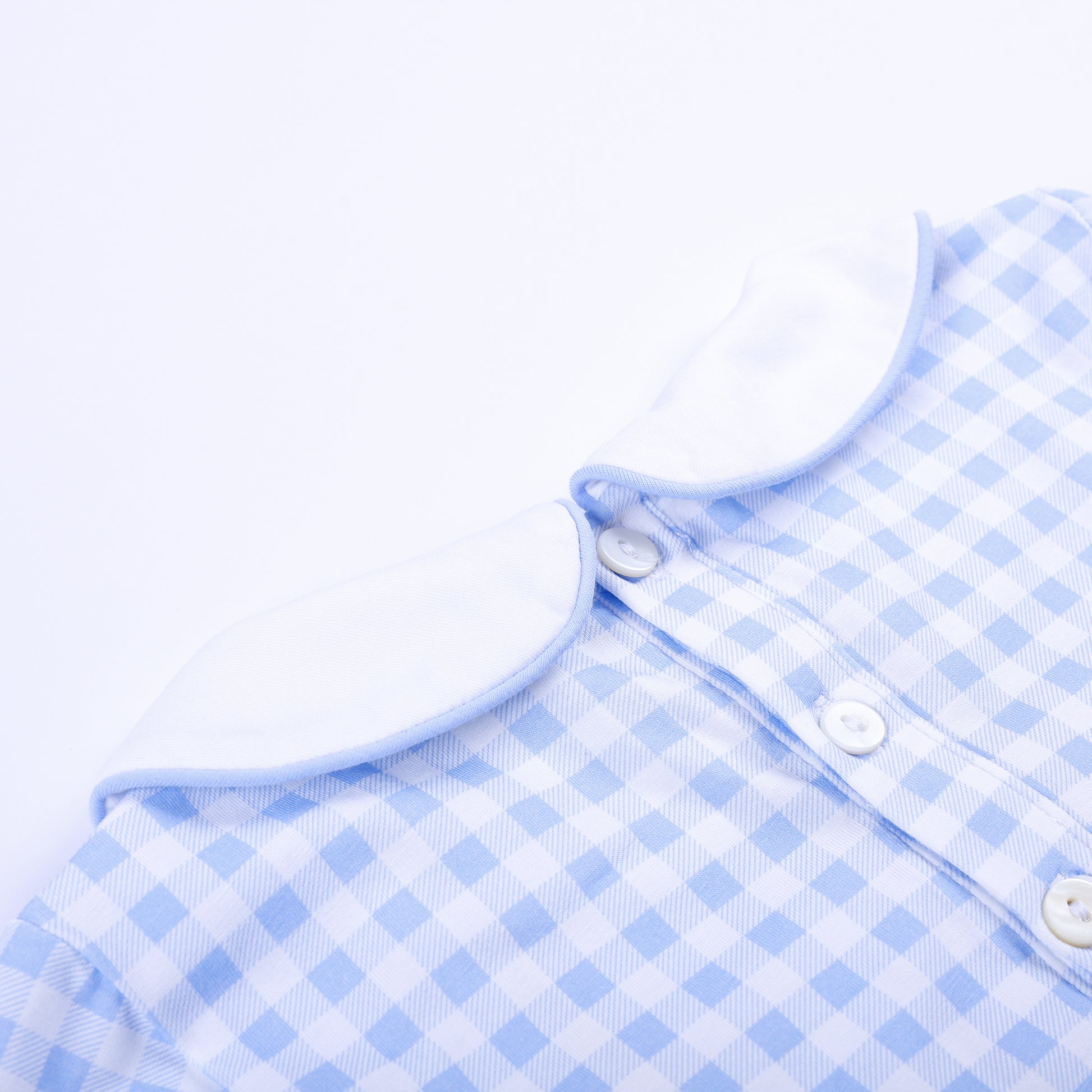 Close-up of back button closure and Peter Pan collar on light blue gingham Little Brother baby bubble.