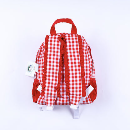 Back view of red gingham full size kids backpack showcasing red ruffle trimmed padded shoulder straps.