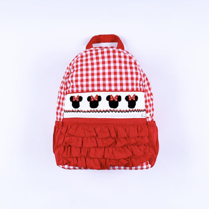 Red gingham full size backpack with hand smocked mouse bow panel and tiered red ruffles for kids.