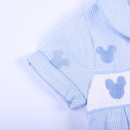 Detailed view of cuffed short sleeve and embroidered mouse icon on Oh Twodles blue gingham hand smocked boys bubble.