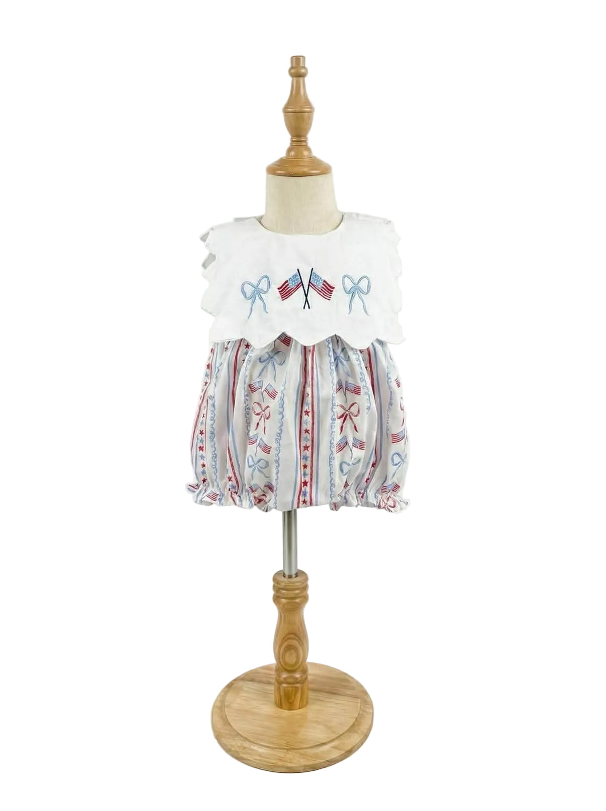 Front view of Patriotic Grandmillennial embroidered bubble outfit on a dress form mannequin showing patriotic print.