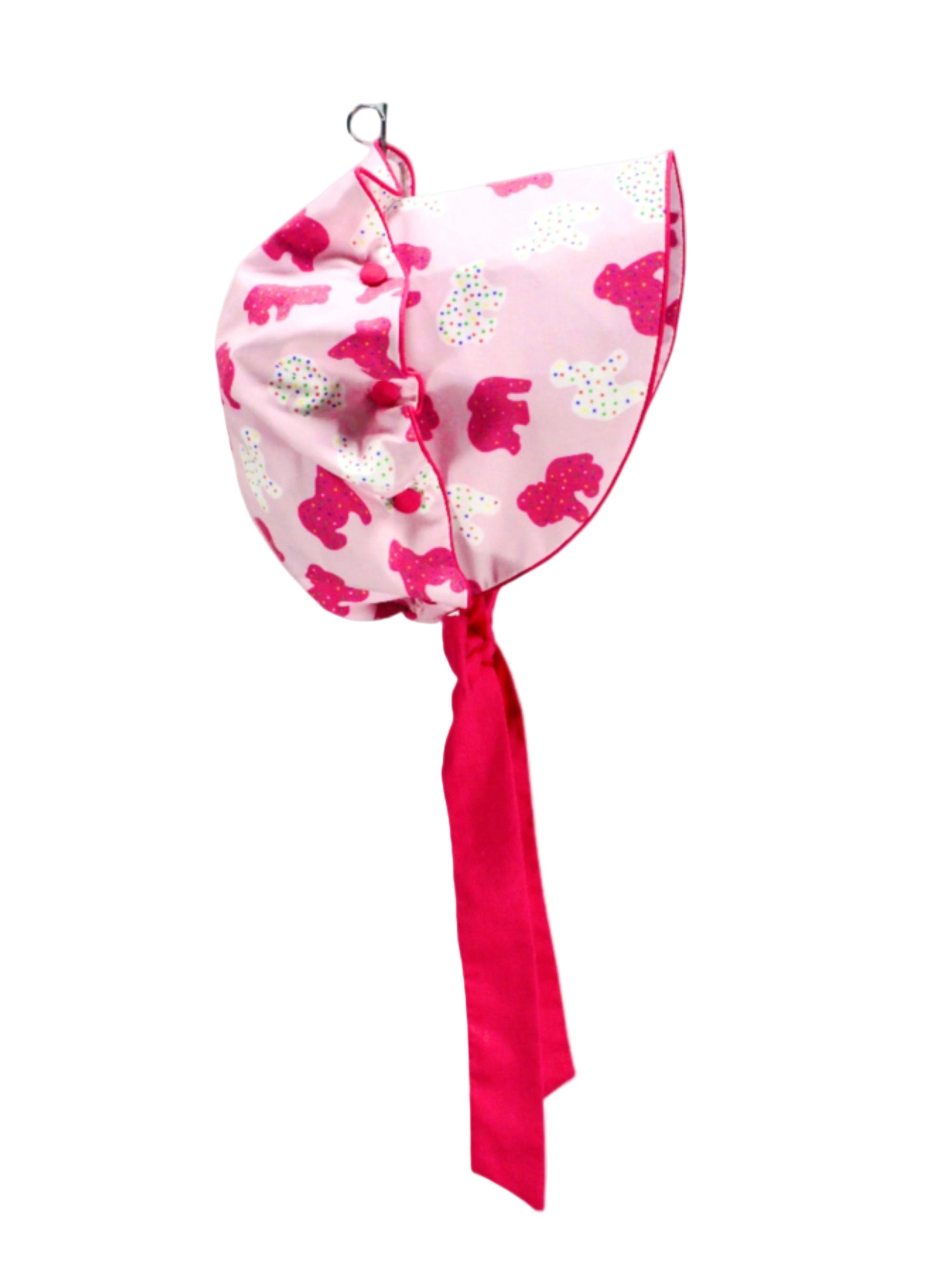 Pink Frosted Animal Cookie Sun Bonnet with hot pink ribbon ties and scalloped brim in Grandmillennial style.