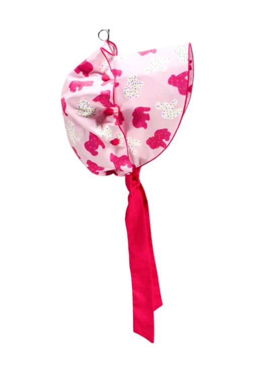 Pink Frosted Animal Cookie Sun Bonnet with hot pink ribbon ties and scalloped brim in Grandmillennial style.