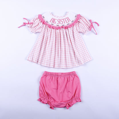 Pink gingham hand smocked Big Sister dress top with matching pink bloomer diaper cover set for toddler girls.