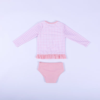 Back flat lay view of the pink gingham fairytale princess two piece swimsuit showing the solid pink bikini bottoms.