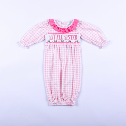 Pink gingham hand smocked Little Sister layette sleep sack featuring a soft ruffle collar, front full view.