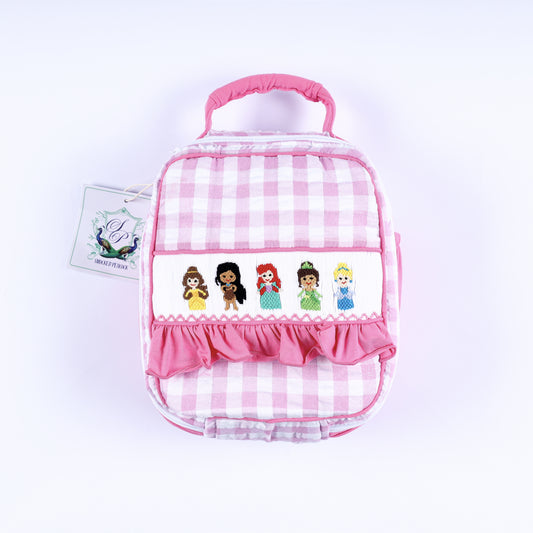 Pink gingham hand-smocked fairytale princess lunch kit bag with a pink ruffle trim for toddler girls.