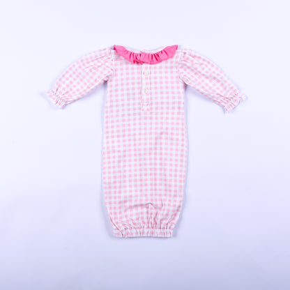 Full back view of pink gingham hand smocked Little Sister layette sleep sack showing button back neck closure.