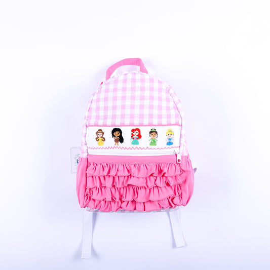 Pink gingham hand-smocked fairytale princess backpack for girls featuring pink ruffles and embroidery.