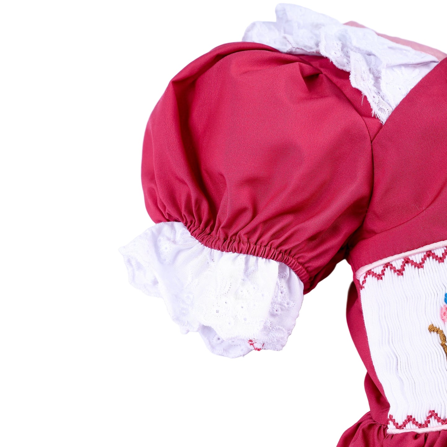 Detailed view of puffed sleeve with white lace trim on hand embroidered sewing mice pink princess dress.